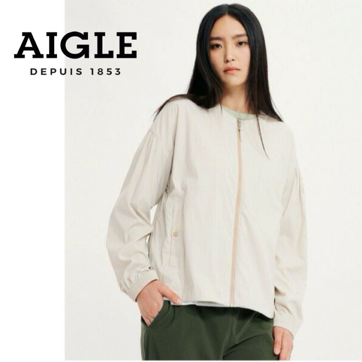 美品◇AIGLE エーグル 定価2.2万 洗える 吸水速乾 UVカット 軽量ブルゾン ノーカラージップナイロンジャケット 40/L ベージュ レディース拍卖