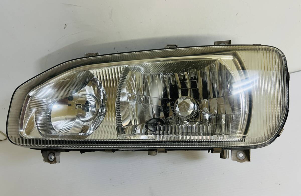 19011N 日産 UD トラックス クオン ヘッドライト ランプ 左 左側 助手席側 KOITO 100-25740拍卖