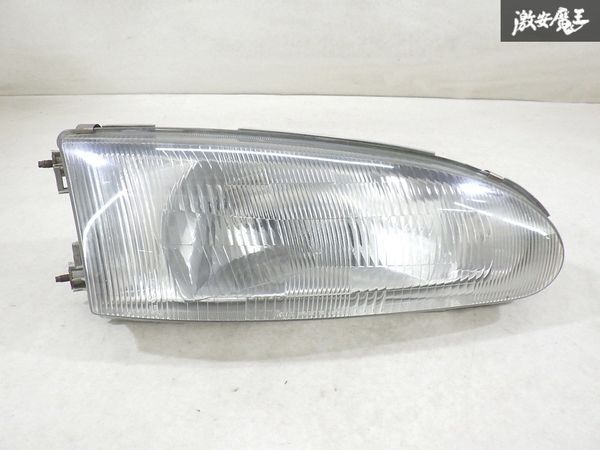 【レンズ割れ無し!!】 三菱 純正 CA1A ミラージュ ハロゲン ヘッドライト ヘッドランプ 片側のみ KOITO 100-37776 棚17-3拍卖