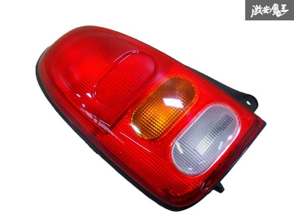 【ストア出品】 DAIHATSU ダイハツ 純正 L700S ミラジーノ 左 左側 助手席側 テールライト ランプ レンズ ICHIKOH 4818 即納拍卖