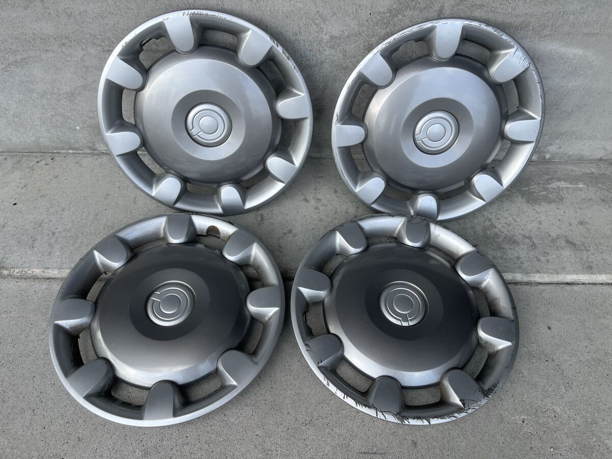 012【ダイハツ:ムーヴ】キャンバス ホイールキャップ 傷多数 ※業販向け ※佐川急便着払い発送拍卖