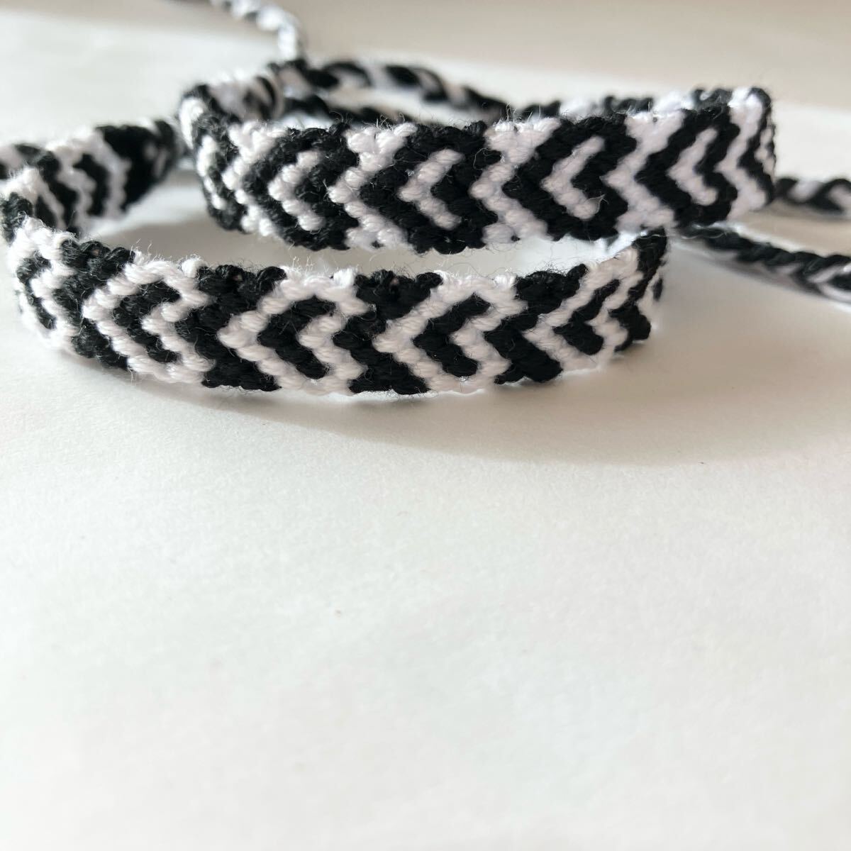 ミサンガ★ハート模様 黒×白拍卖