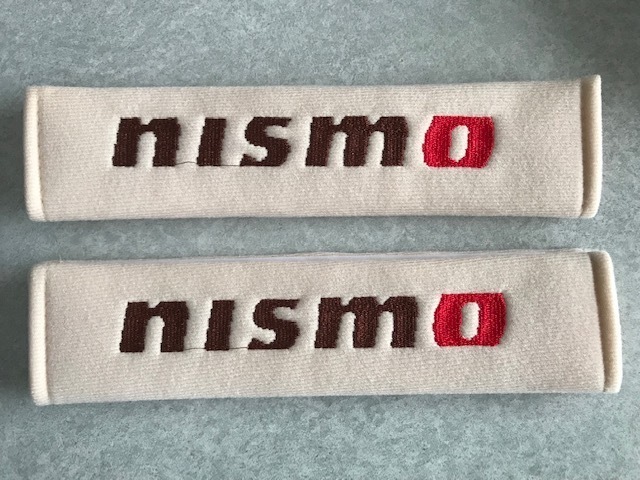 誰も持ってない?さり気なく目立つ! NISMO ニスモロゴ アイボリー色シートベルトカバー 送料0円! GTR マーチ オーラ ノート拍卖