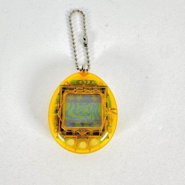 BANDAI 1996 たまごっち s13 初期型 クリアイエロー 携帯液晶ゲーム キーチェーン 動作未確認 ジャンク F拍卖