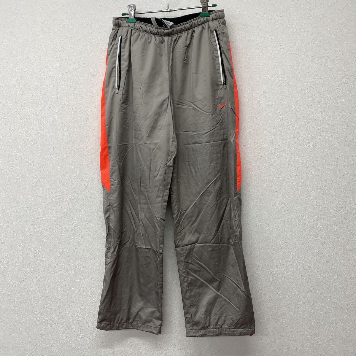 NIKE ナイキ ジャージ ナイロン トラックパンツ グレー オレンジ M こ35拍卖