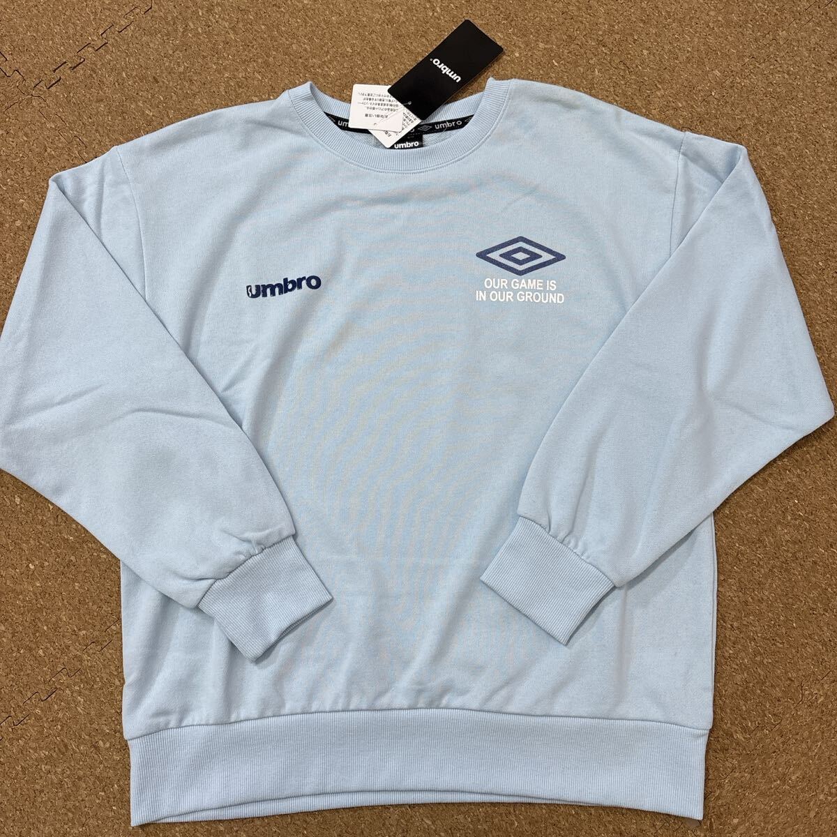 新品未使用タグ付きMサイズ 長袖トレーナー スウェット アンブロumbro 水色拍卖