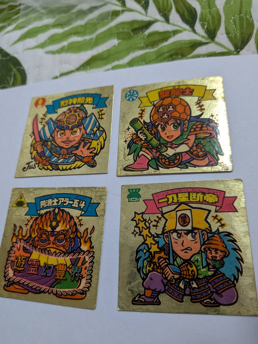 即決 烈神照光 聖胞子 一刀星断帝 同源士アラー五斗  在庫4枚 金色 14 15弾 旧ビックリマン チョコ版 天使 ばら1枚値段拍卖