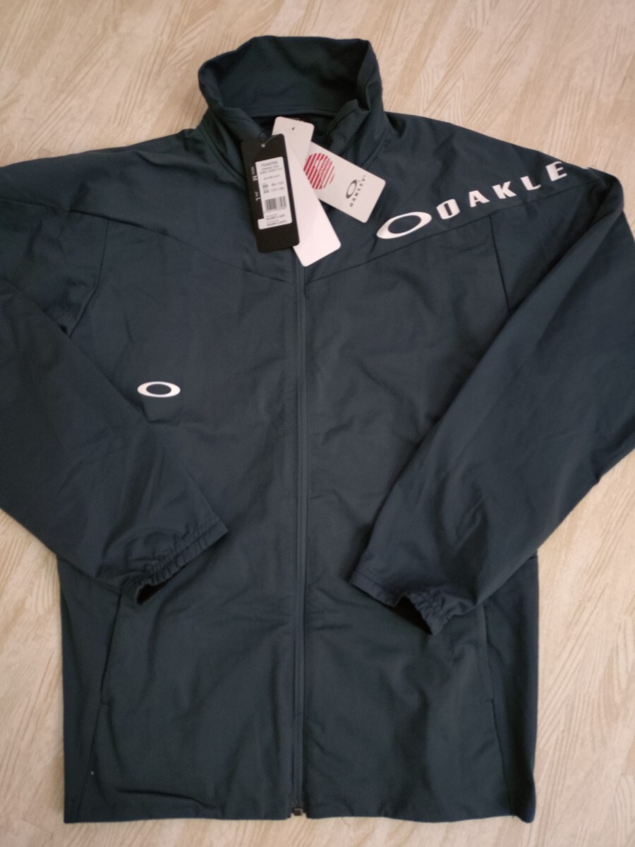 オークリーOAKLEYジャケット Lサイズ新品ランニングウェア アウトドアウェア拍卖