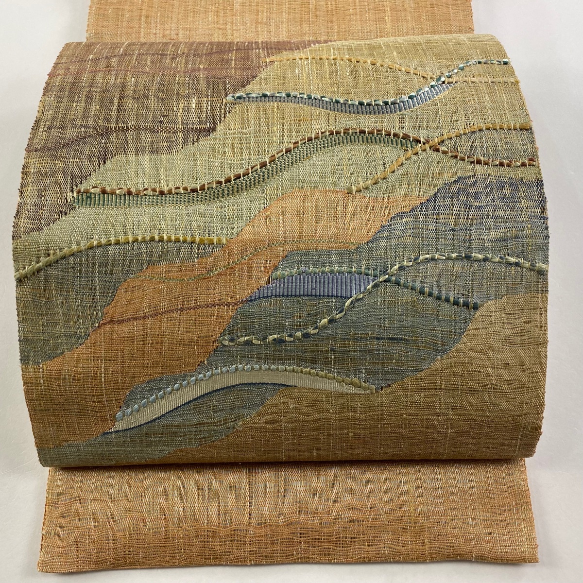 袋帯 美品 秀品 幾何学模様 薄オレンジ お太鼓柄 正絹 【中古】拍卖