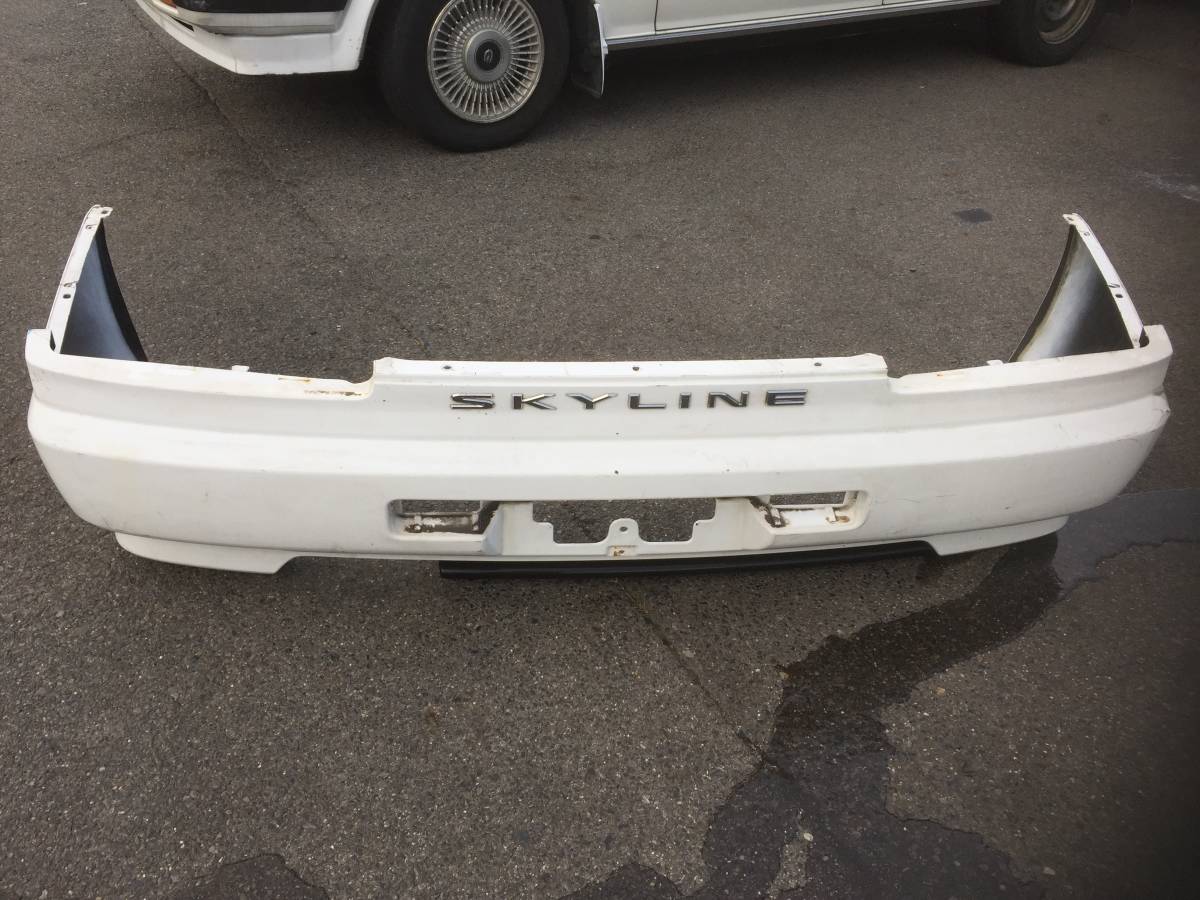 ☆P919-1 NISSAN 日産 スカイライン GTターボ R34系 純正リアバンパー 白系 中古品☆拍卖