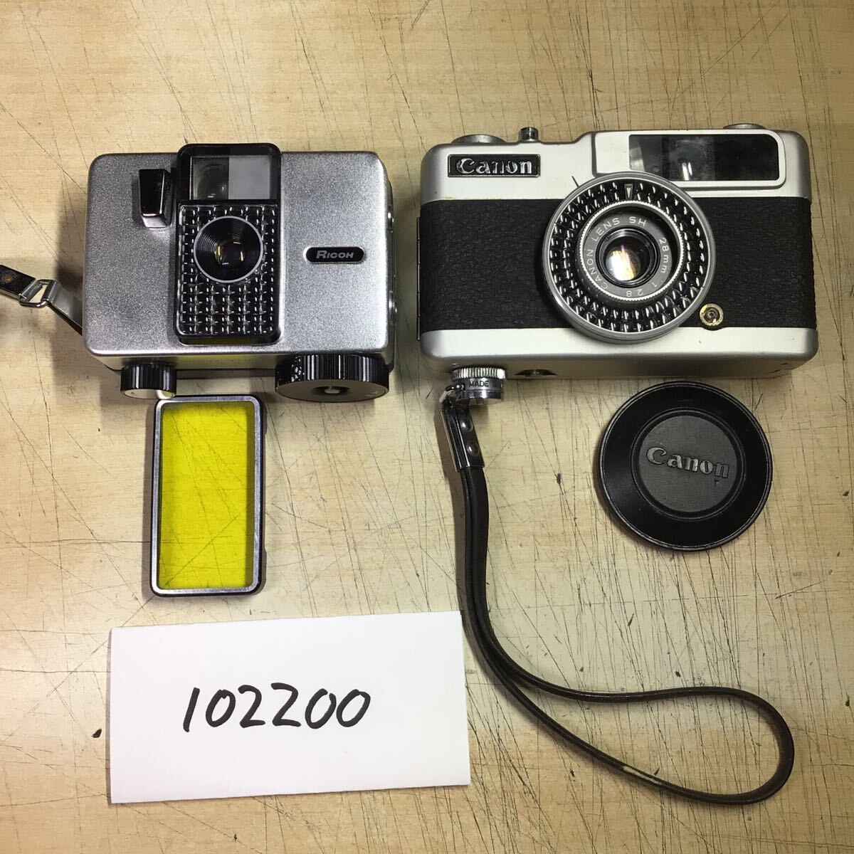 【送料無料】(102200C) Canon demi EE28 / RICOH AUTO HALF コンパクトカメラ ジャンク品 2台セット拍卖