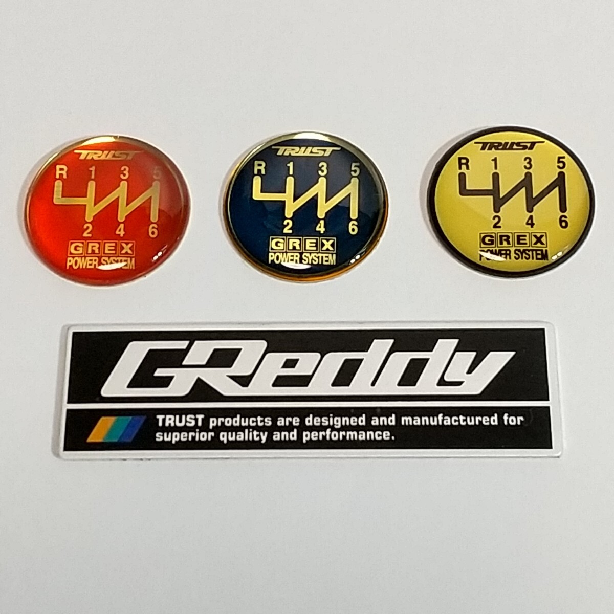 ☆未使用品・送料無料☆ 当時物 TRUST トラスト シフトノブ パターン エンブレム 6MT 6速 R左上 3色 & GReddy アルミ製 エンブレム セット 拍卖