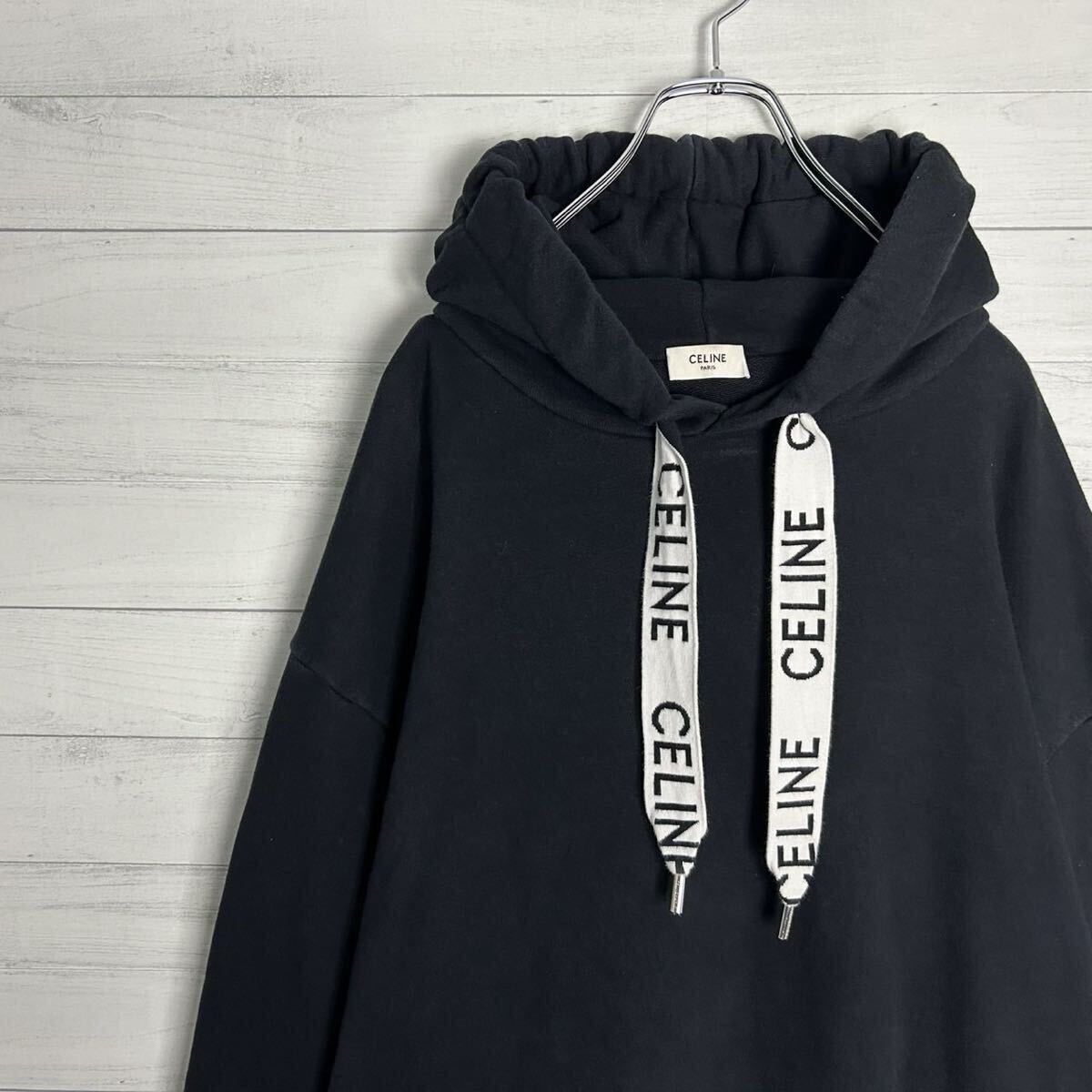 極美品 人気 CELINE セリーヌ ドローコード 紐ロゴ パーカー フーディ オーバーサイズ プルオーバー XXL ブラック 黒 トップス メンズ拍卖