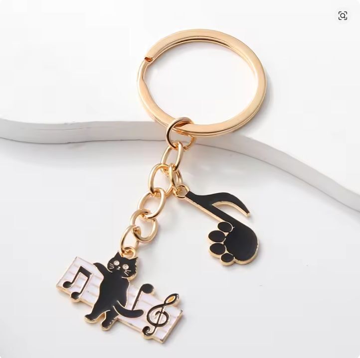 【送料無料】★ピアノの先生・生徒さん必見!【音符と黒猫のキーホルダー】音楽愛をいつもそばに♪ 発表会 記念品にも 匿名配送拍卖