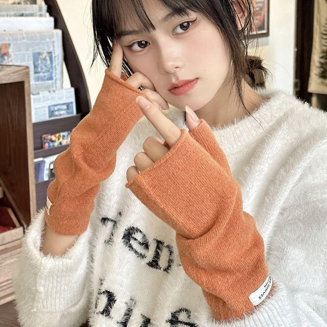 オレンジ アームウォーマー 指なし ニット素材 防寒拍卖