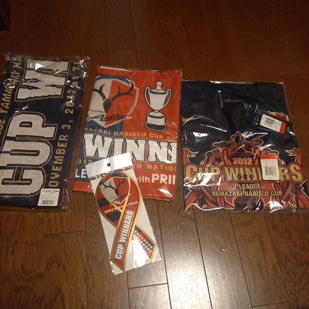 グッズ ナビスコカップ 鹿嶋アントラーズ ニットマフラー ナイキ L シャツ 未使用 フェイスタオル 2012 まとめて サッカー 拍卖