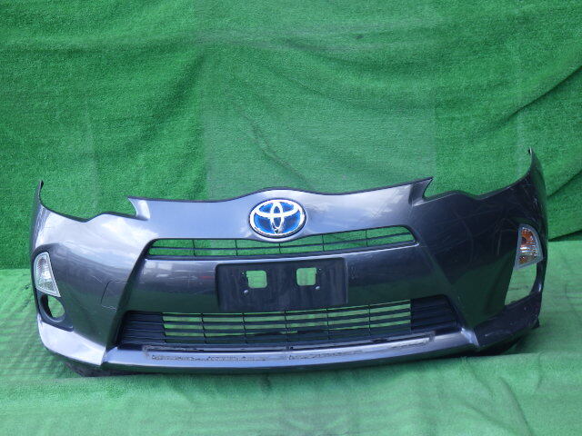 NHP10 前期 アクア 純正フロントバンパー 左右ウインカー ロア グリル 右フォグカバー付 AQUA グレー 52119-52620拍卖
