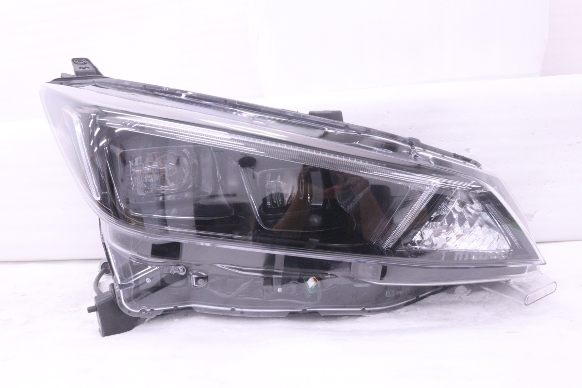 50-2734★美品 後期 LED ZE1 リーフ★右ヘッドライト ICHIKOH 1954 打刻:R ユニット ブラック 純正★日産 (UK)拍卖