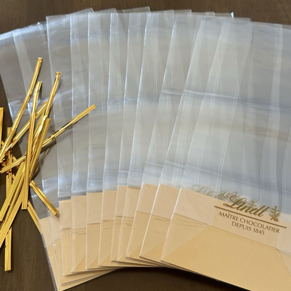 Lindt リンツ ビニール袋 12枚 ショッパー ショップ袋 プレゼント ギフト ラッピング ギフトバッグ リメイク お裾分け 袋 スイス 新品拍卖