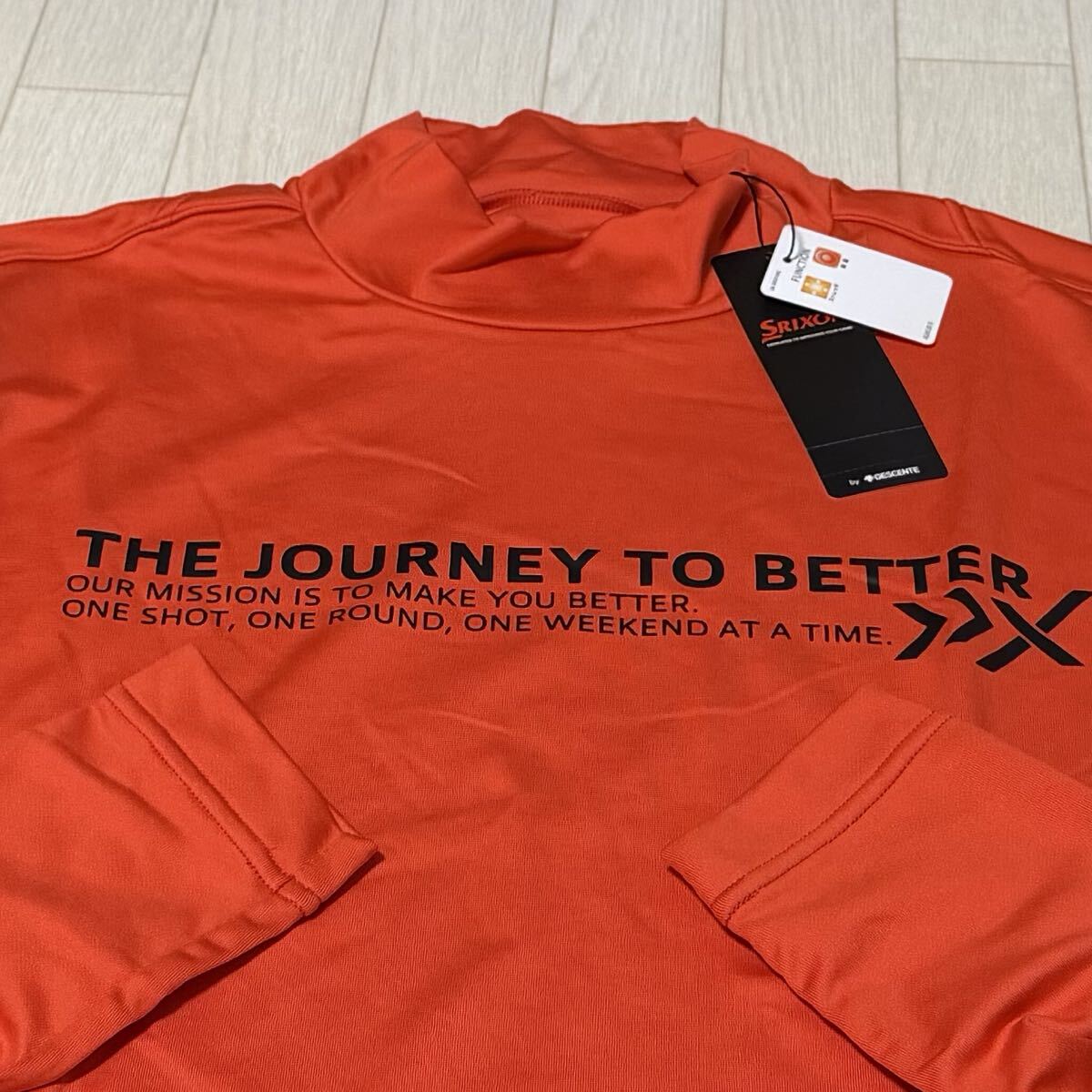 新品★スリクソン SRIXON ロゴプリント 裏微起毛 保温 長袖ハイネックシャツ/オレンジ/サイズLL拍卖