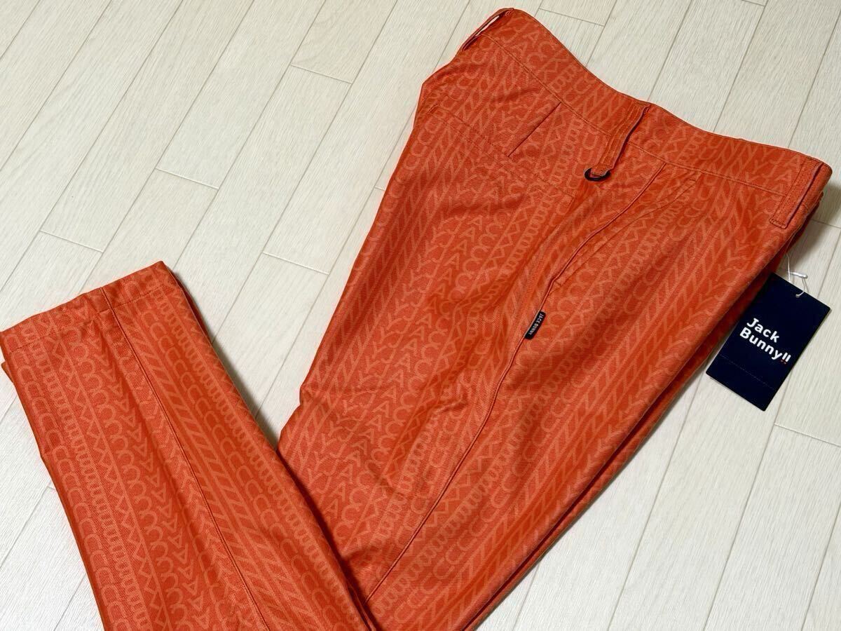 新品★パーリーゲイツ PEARLY GATES Jack Bunny!! 総JBロゴプリント 防風ツイル ストレッチ テーパードパンツ/秋冬/オレンジ/サイズ4拍卖