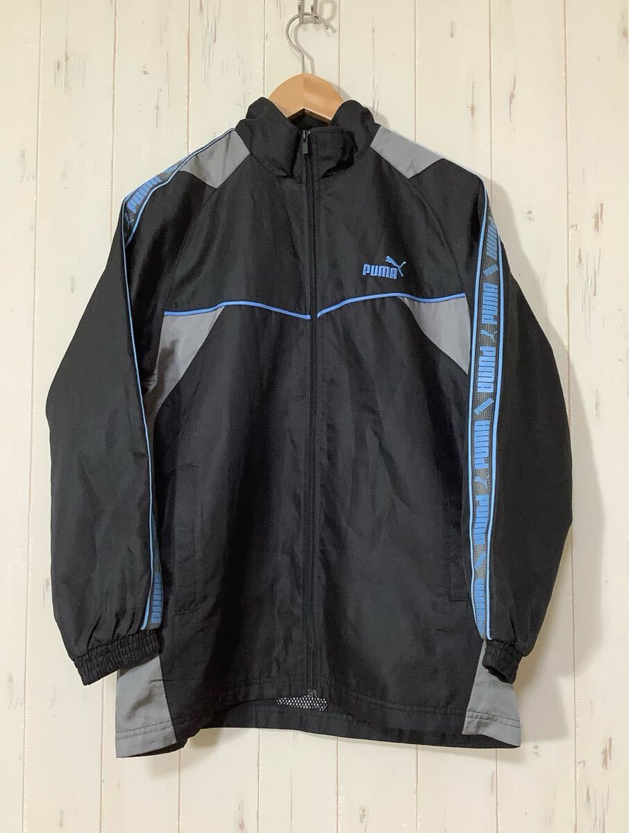 た1778 PUMA プーマ ウインドブレーカー ウインドジャケット 160 キッズ ブラック/グレーライトブルー ロゴ刺繍 裏トリコット拍卖