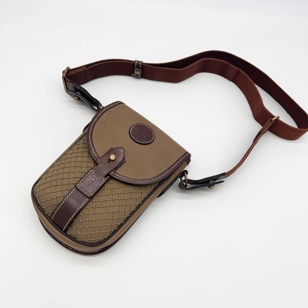 A312【良品】ハンティングワールド HUNTING WORLD ボディバッグ ショルダーバッグ サコッシュ 肩掛け カーキ キャンバス レザー 男女兼用拍卖