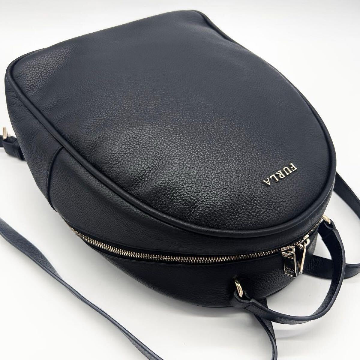 A416【美品】FURLA リュック レザー シボ革 黒 ゴールド金具 男女兼用 フルラ 大容量 ブラック オールレザー バックパック ユニセックス拍卖