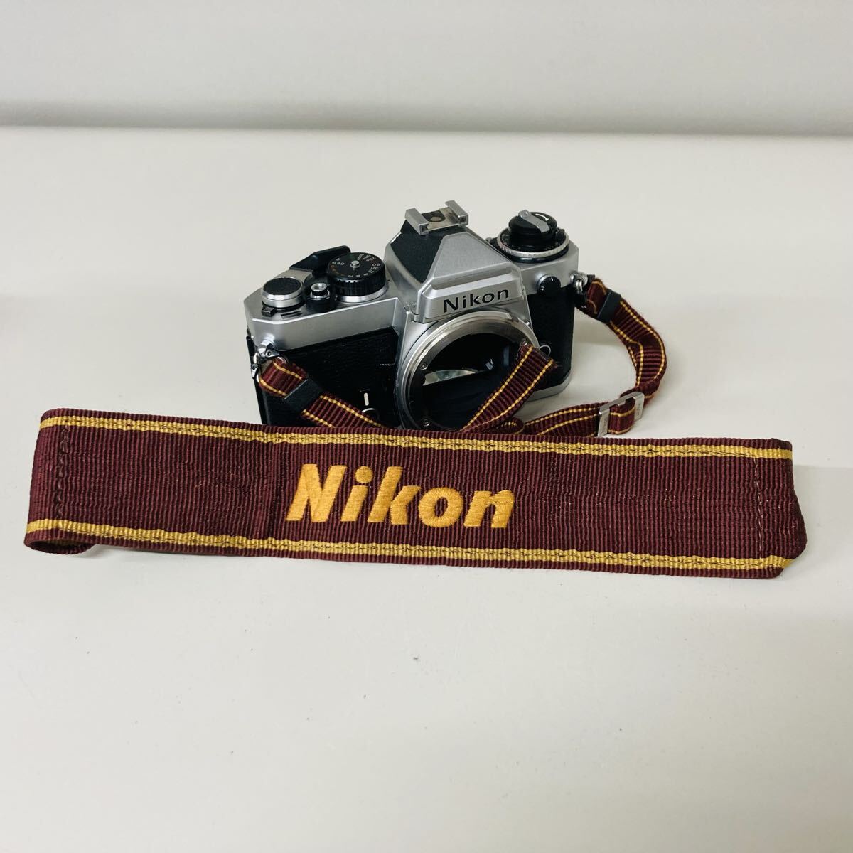 ★Nikon★《1円》〔ストラップ付き〕FE フィルムカメラ ボディ N67-44 ニコン カメラ拍卖
