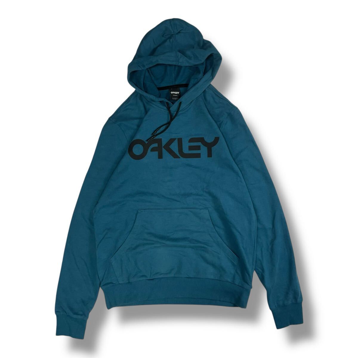 (TK1019) OAKLEY オークリー B1B プルオーバー パーカー フーディー ターコイズブルー ロゴプリント 定番 XL拍卖