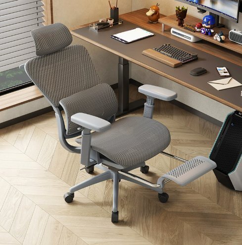 椅子が透かし彫りで長く座るコンピュータの椅子家庭用のオフィスチェア快適人体工学書斎の机学生の椅子の背もたれです拍卖