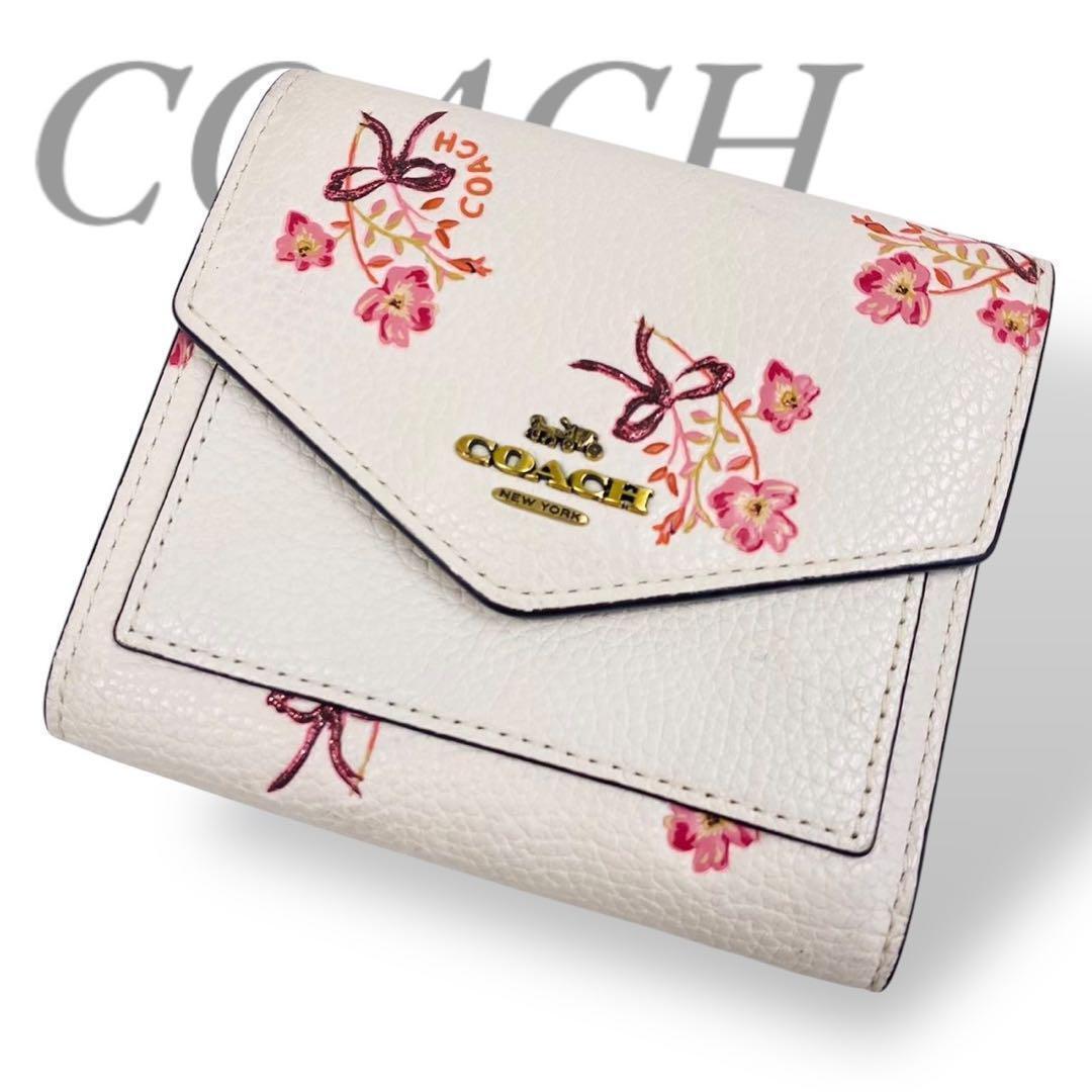 【B2327】 COACH コーチ 三つ折り財布 コインケース カード入れ コンパクト 花柄 フラワー リボン ピンク レザー ホワイト 金ロゴ ジップ拍卖