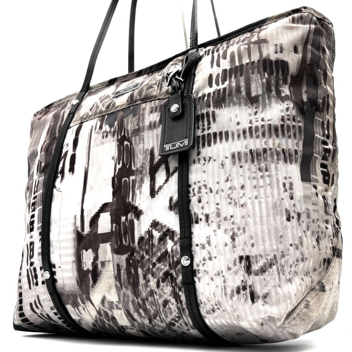 1円 希少モデル TUMI トゥミ ビジネスバッグ トートバッグ メンズ レザー ナイロン ロゴ 総柄 大容量 肩掛け A4 PC◯ 通勤 ジップ 軽量 黒拍卖