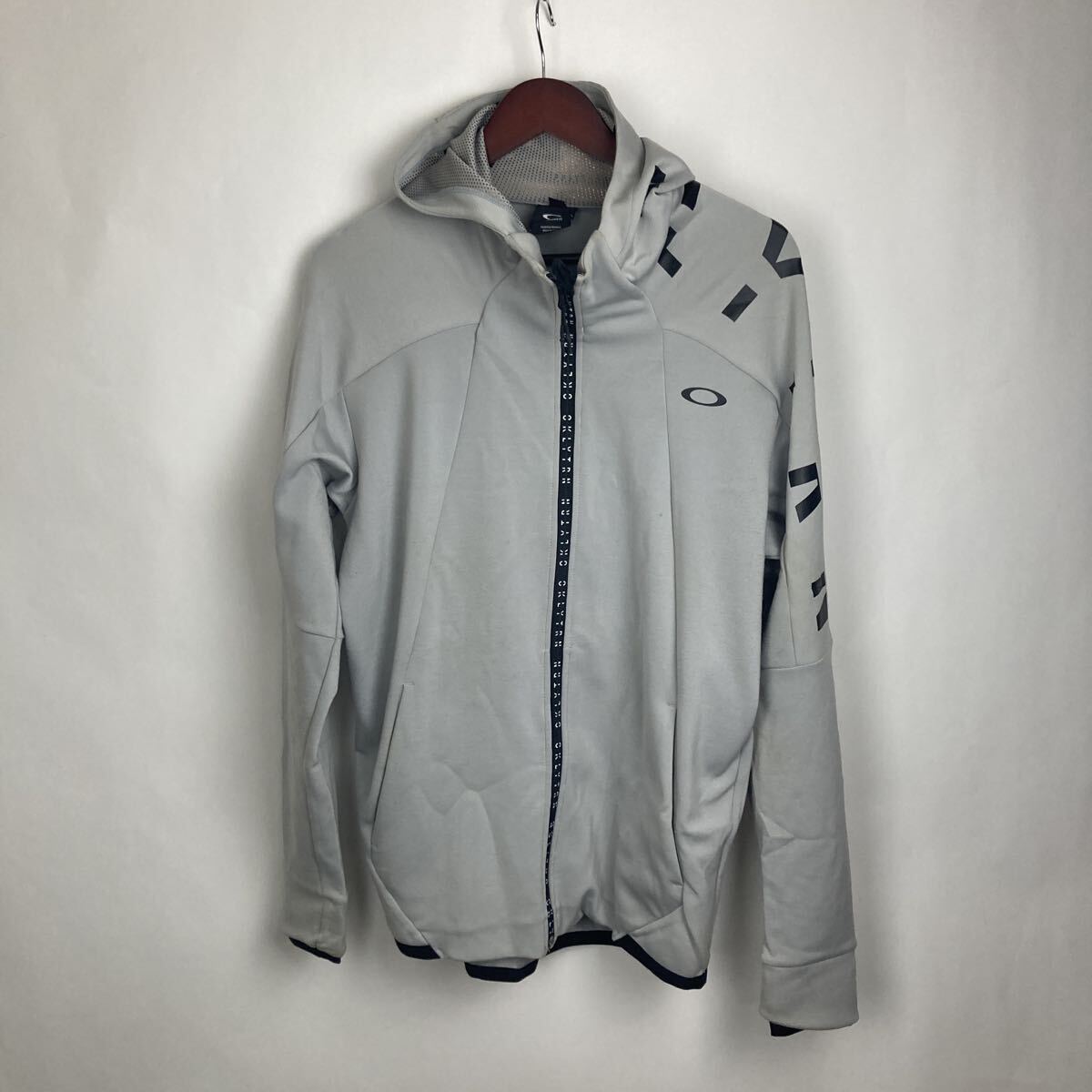 オークリー OAKLEY パーカー ジャケット ブラック L ジャージ Jacket スポーツウェア トレーニングウェア ワンポイント プリントTシャツ拍卖