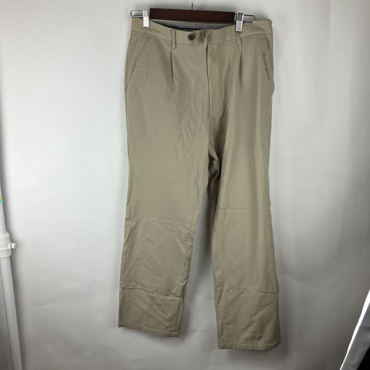 マンシングウェア Munsing wear ベージュ チノパン ボトムス 古着 パンツ アメリカ古着 長ズボン Mサイズ 紳士服拍卖