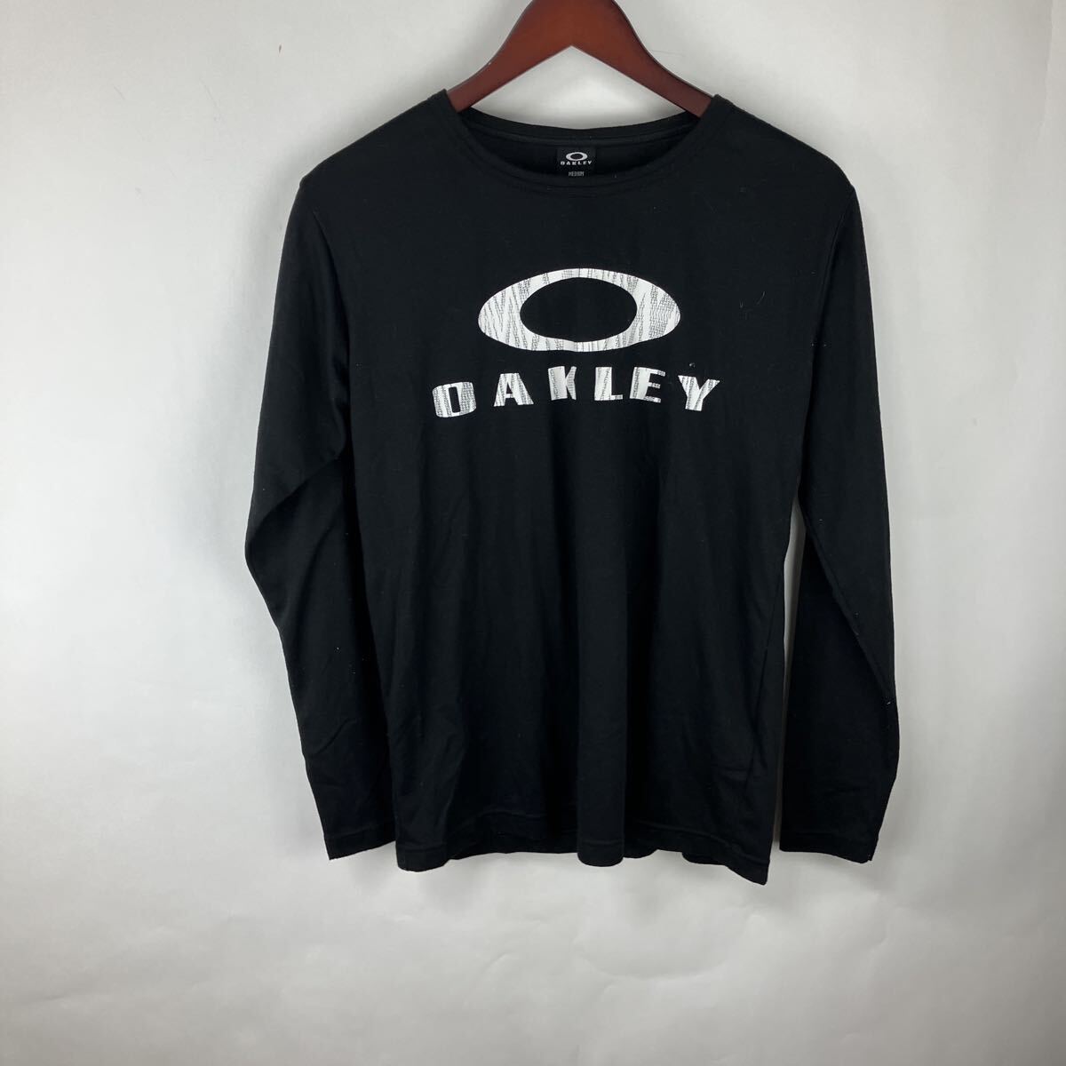 オークリー OAKLEY ブラック 半袖Tシャツ Tシャツ 黒 s 長袖Tシャツ トップス 長袖 ロゴTシャツ スポーツウェア拍卖