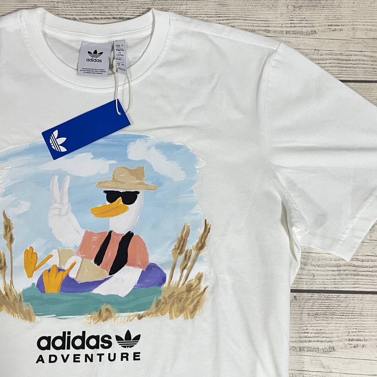 ★ adidas ADVENTURE (アディダス アドベンチャー) ★ グラフィックTシャツ Lサイズ 白色 アウトドア トレフォイル (タグ付き新品未使用)拍卖