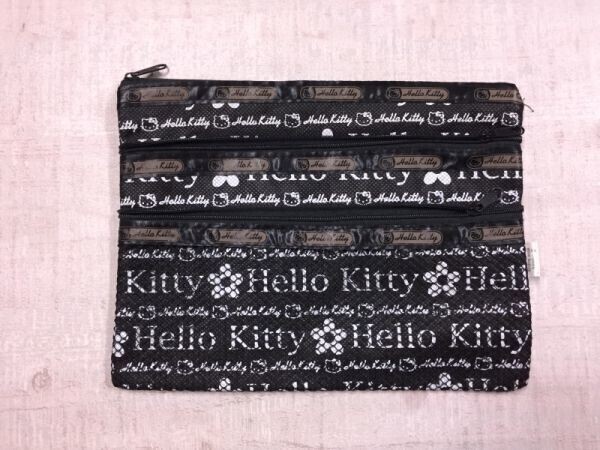 ハローキティ Hello Kitty サンリオ Sanrio キャラクター 小物入れ ロゴ総柄 ポーチ レディース マルチポケット 黒拍卖