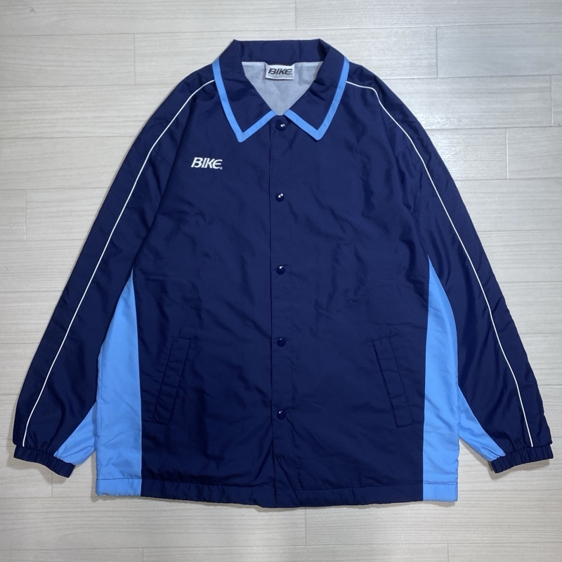 BIKE/バイク/ウォームアップジャケット/バスケウエア/コーチジャケット/スポーツ/スナップ式/ストリングコード/刺繍ロゴ/アームライン拍卖