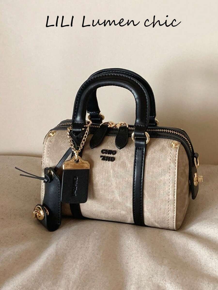 バッグ レディース ハンドバッグ この クラシックで スタイリッシュな レディースハンドバッグには メタルのハンギングデコレーショ拍卖