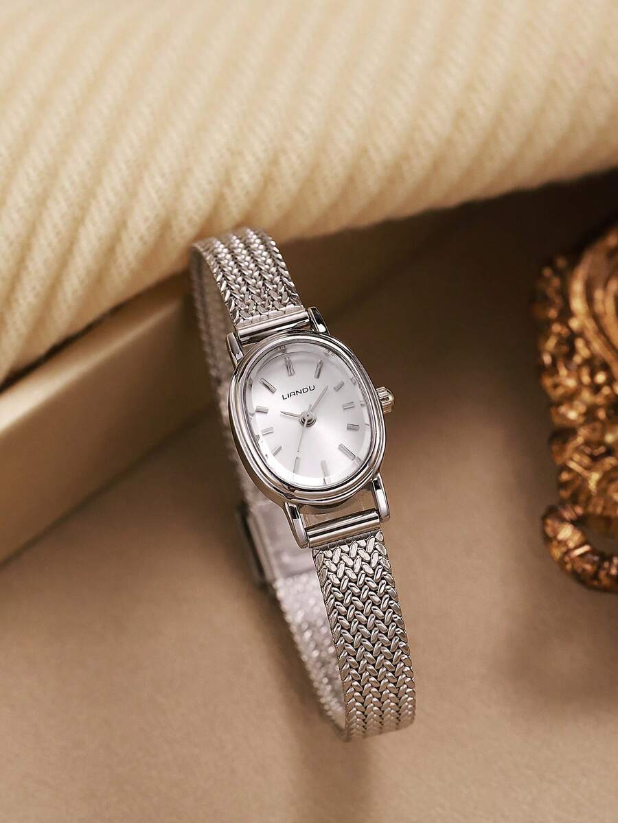 腕時計 レディース クォーツ 1個 オーバル型ヴィンテージスタイル、ファッショナブルでエレガント、スタッズ付きダイヤル、調整可能な拍卖