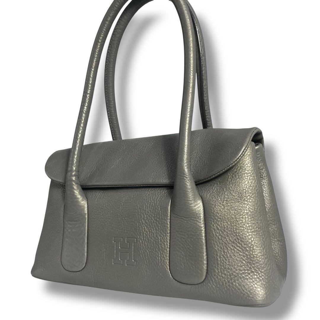 美品 ヒロフ ペルーシェ Hロゴ ショルダーバッグ シボ革 シルバー 430拍卖