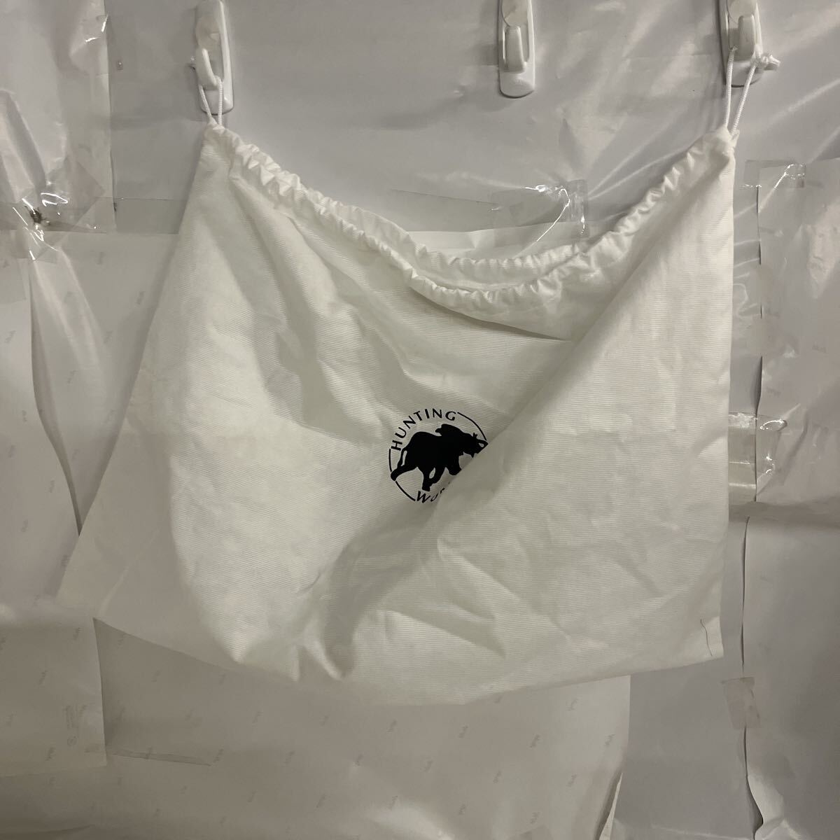 ハンティングワールドバッグの入っていました袋拍卖