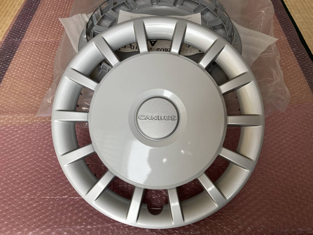 新車添付 未使用品 850系 ダイハツ ムーヴ キャンバス 純正 14in ホイールキャップ 42602-B2310-B1 A3 シルバー×パールホワイト 4枚 ☆②拍卖
