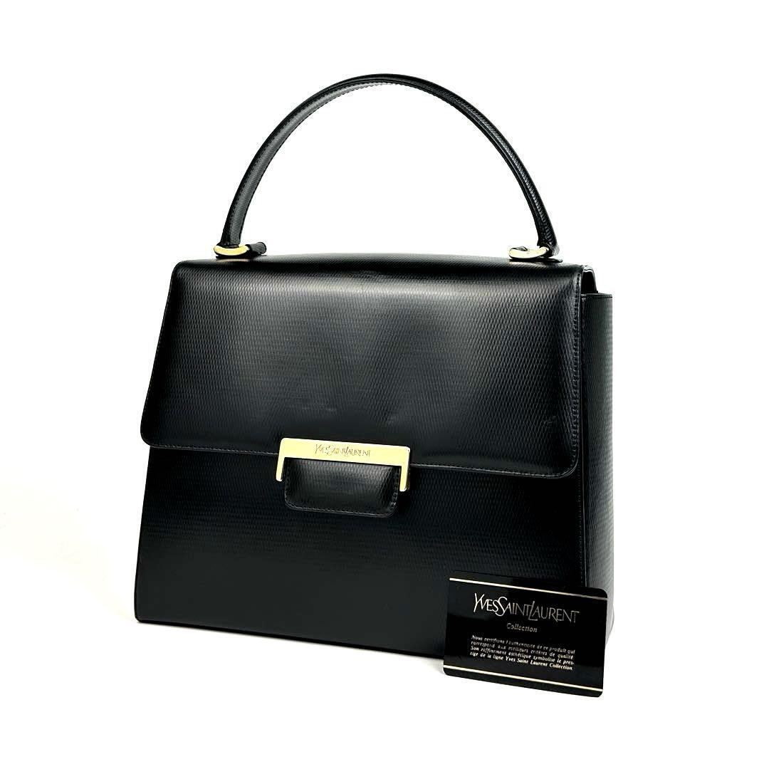 美品■Yves Saint Laurent イヴサンローラン ハンドバッグ YSL カサンドラ ゴールド金具 ダイヤ カットワーク 裏地総柄 レザー 黒 ブラック拍卖