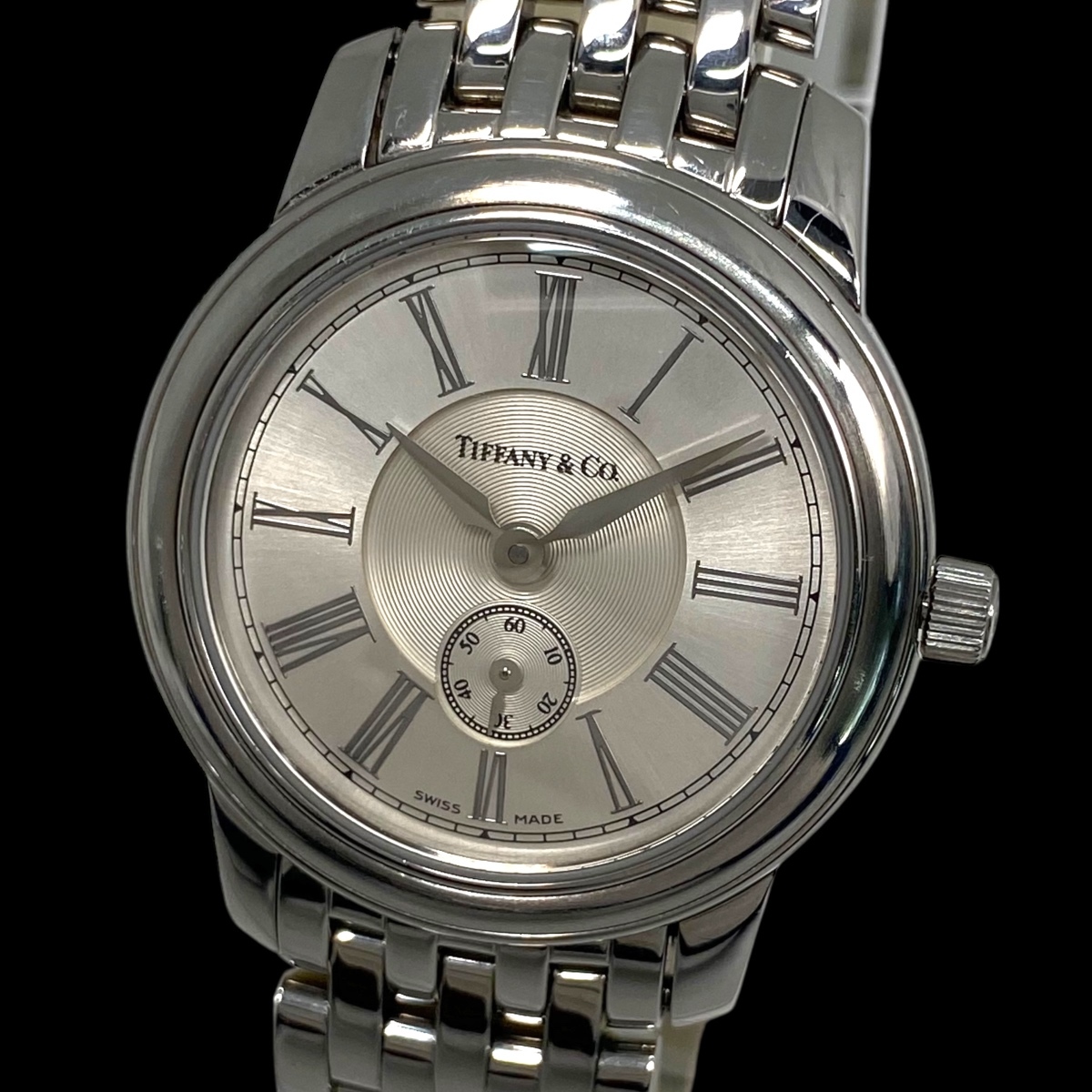 2510T043TIFFANY&Co.ティファニーマークラウンド レディース腕時計 動作品クォーツ スモセコ ラウンド シルバー文字盤ローマンインデックス拍卖