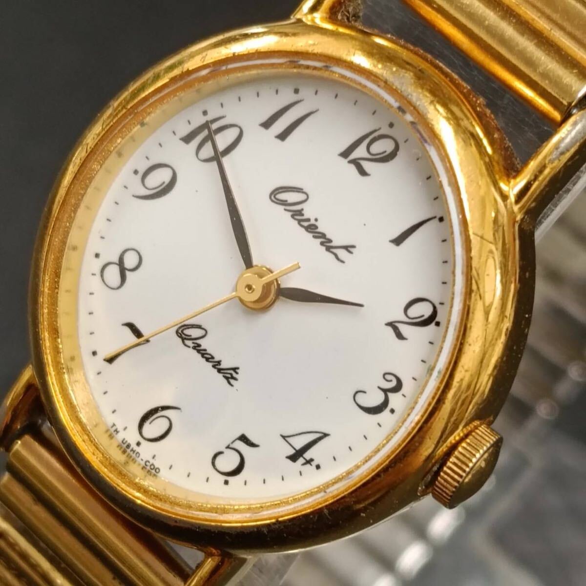 T110【レア】 Orient オリエント 腕時計 クウォーツ 3針 白文字盤 アナログ ヴィンテージ アクセサリー ゴールド色 銀色 ブレス Y2K 80s拍卖