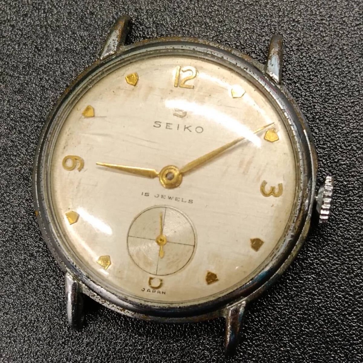T285【レア】 SEIKO セイコー 腕時計 12058 手巻き 3針 白文字盤 デイト アナログ ヴィンテージ アクセサリー シルバー色 Y2K 80s拍卖