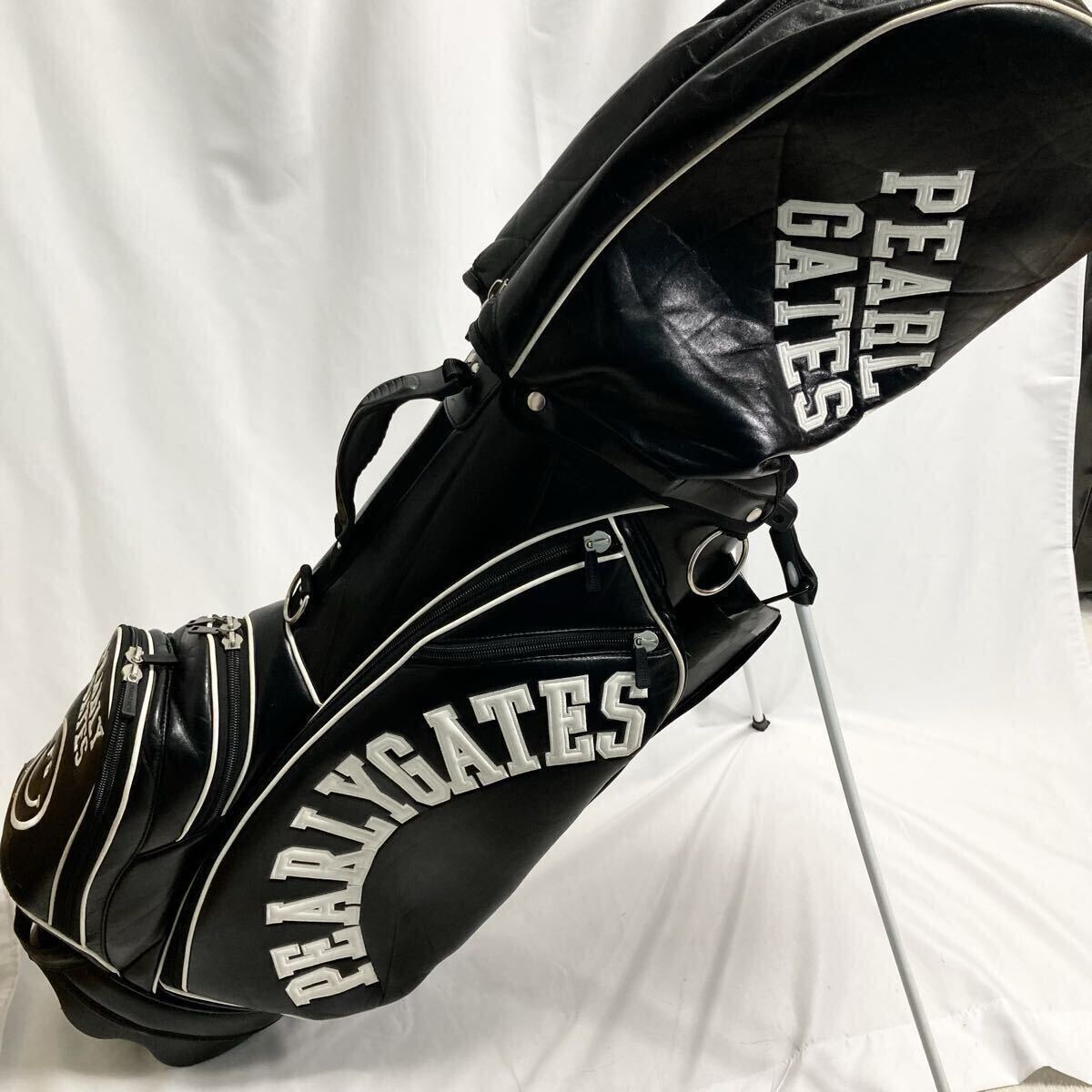 パーリーゲイツ PEARLYGATES キャディバッグ ゴルフバッグ GOLF ロゴ デカロゴ スタンド PG89 ニコちゃん レザー ネイビー 白 ホワイト 紺拍卖