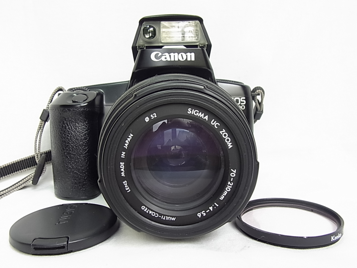 CanonキヤノンEOS 1000 S:QD-PレンズSIGMA uc ZOOM70-210mm 1:4-5.6※附属品:ショルダ-ベルト:フイルタ-一枚:レンズキヤプ拍卖